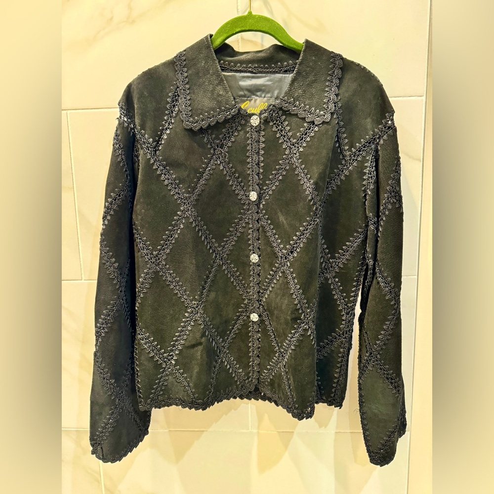 Scully black leather jacket with crochet design stitching, size medium